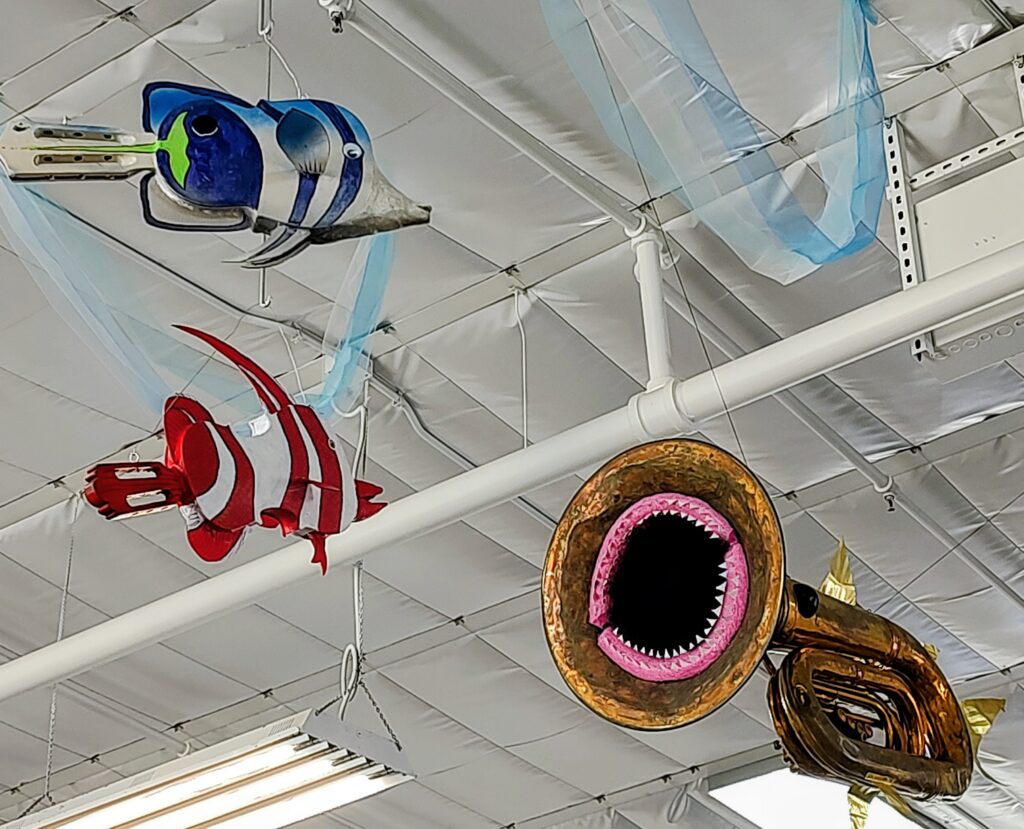 Joe Mussulman's colorful suspended fish art installation at Second Sky in Tucson, Arizona.